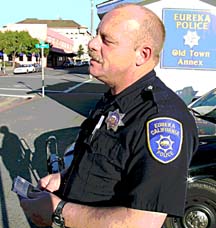 [Officer Mike Quigley in front of Old Town police annex]