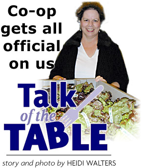 Heading: Talk of the Table, Co-Op gets all official on us, Story and photo by HEIDI WALTERS