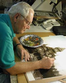 Sam Swanlund working on handcoloring a photo of the Carson Mansion