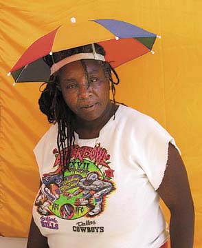 [Betty Edwards wearing umbrella hat and Superbowl t-shirt]