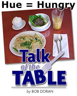 heading: Hue=Hungry, Talk of the Table by BOB DORAN, photo of Vietnamese food.