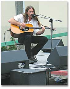 photo of Former coordinator Matthew Cook performing at the 2005 fair. He did not attend this year.