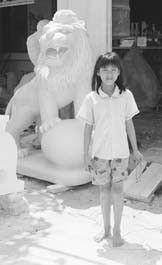 [photo of girl with marble lion]