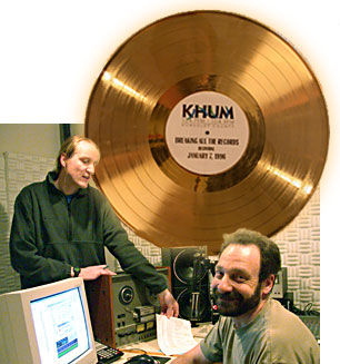 Photo of Mike Dronkers and Cliff Berkowitz of KHUM, "breaking all the records beginning January 7, 1996."