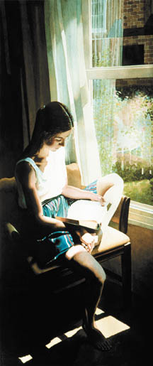 woman reading in window light