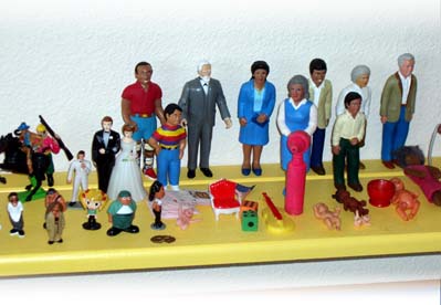 collection of plastic people and objects