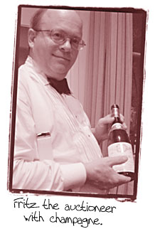 photo of Fritz the auctioneer with champagne