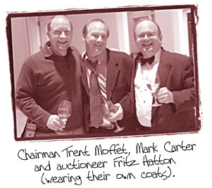 Photo of Chairman Trent Moffet, Mark Carter and auctioneer Fritz Hatton (wearing their own coats).