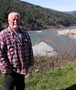photo of Bill Pearson at the confluence of the Klamath and Trinity rivers in Weitchpec.