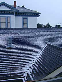 photo of hail on rooftops in Eureka