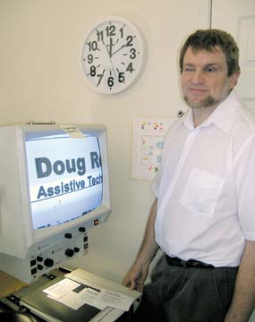 [Doug Rose in front of computer]