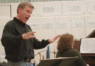 man singing to pianist accompaniment