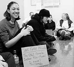 [photo of students sitting in hallway at HSU]