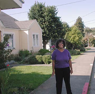 [photo of Connie Stewart in neighborhood]