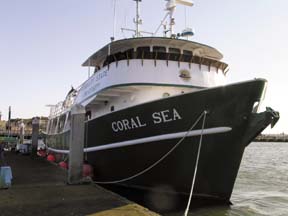 [the vessel Coral Sea, at dock]
