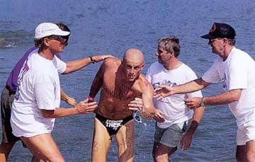 [Mike Pigg coming out of the water during triathlon]