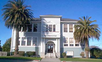 Front of Washington School with palm trees