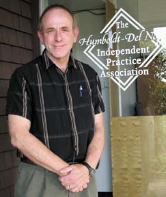 [Dr. Alan Glaseroff standing in front of door to the Humboldt-Del Norte Independent Practice Association