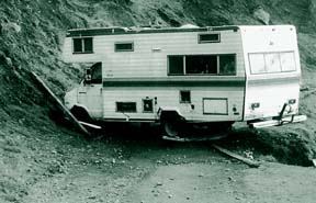 [photo of abandoned RV]