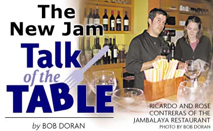 Heading: Talk of the Table, the New Jam, by Bob Doran. Photo of Ricardo and Rose Contreras of the Jambalaya