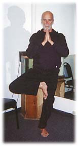 Don Robertson in standing yoga position