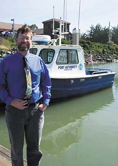[man standing near Port Authority boat]