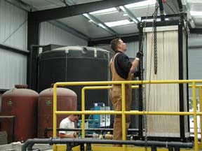 A worker in Cher-ae Heights Casino wastewater treatment plant