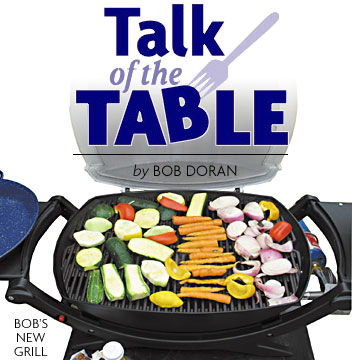 Heading: Talk of the Table, photo of Bob's new grill