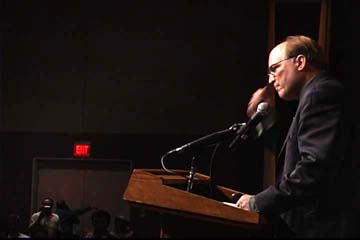 [David Cobb speaking at lectern]