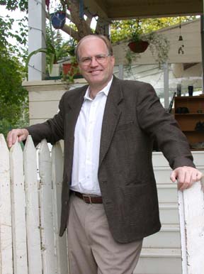 [David Cobb on porch of his home]