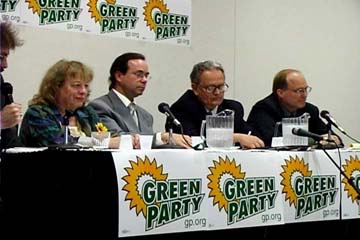 [Candidates sitting at table]