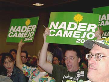 [People holding Nader/Camejo 2004 signs]