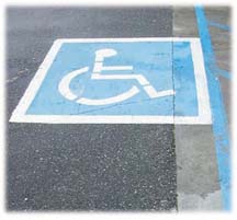 [photo of disabled symbol in parking lot]