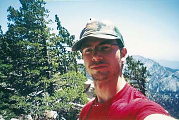 Arno in front of mountains and trees