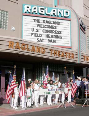[Ragland Theater facade, with 4-H kids holding American flags]