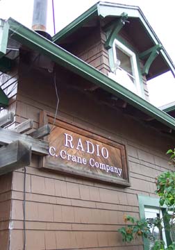 [Sign "Radio C. Crane Company" on house/office of C. Crane Co.]