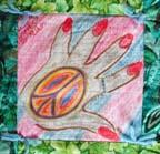 Quilt detail, drawing of hand with peace symbol