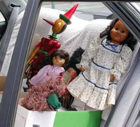 [dolls in car]