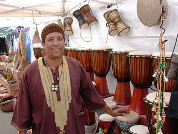 [Mohammed Doulaki among percussion instruments]
