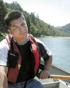 Mike Orcutt rowing boat