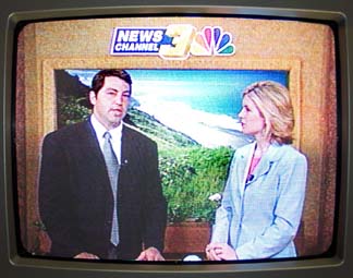 [Dr. Doug on TV, channel 3 news with newscaster]