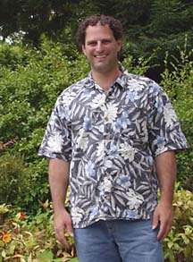 Darin Price smiling and wearing tropical shirt