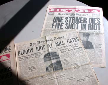 [Humboldt Standard newspaper with headline reading "One striker dies, five shot in riot" and the Humboldt Times newspaper headline reading "Bloody riot at mill gates"]