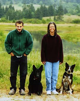 Richard Guadagno with fiancee Dique LaPenta and dogs, standing near pond