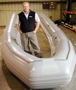 Bill Wing standing inside a rigid inflatable boat