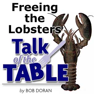 Heading: Freeing the Lobster, Talk of the Table by Bob Doran, photo of a Maine Lobster