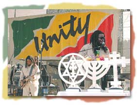 photo of Morgan Heritage and the Unity sign