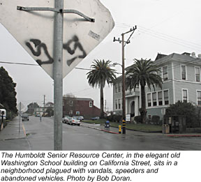 Photo of The Humboldt Senior Resource Center, in the elegant old Washington School building on California Street, sits in a neighborhood plagued with vandals, speeders and abandoned vehicles. Photo by Bob Doran.