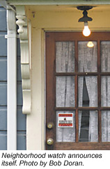 photo of Neighborhood watch sticker on door by Bob Doran